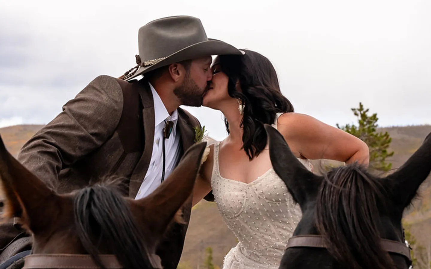 Couple on horseback at Meadowlark Ranch